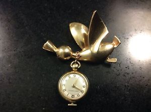 extremely rare VINTAGE GIRARD PERREGAUX-14 KT GOLD WATCH BROOCH