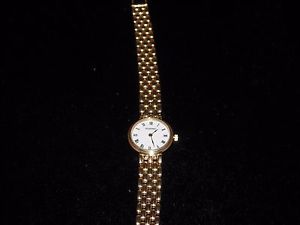 584 14k yellow gold Tourneau quarts women's wrist watch 30 grams 7.25 inch