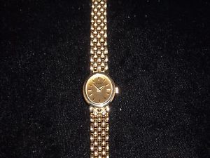 586 14k yellow gold Tourneau quarts women's wrist watch 31 grams 7.25 inch