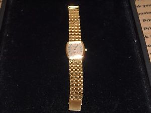 589 14k yellow gold Geneve quartz watch 59.8 grams rectangular face 7.75 inch