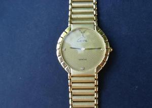 14 K  , 585  solid gold watch  Swiss made  Carina  in working order