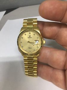 festina 18k gold watch