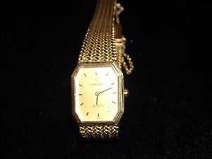 590 18k yellow gold concord quartz women's watch 30 grams 7 inch w/safety chain