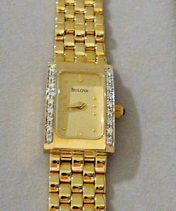 Ladies 14K Yellow Gold & 18 Diamond BULOVA Bracelet-style WATCH