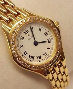 AUTHENTIC SOLID 14K YELLOW GOLD WHITE DIAL WITH 36 DIAMONDS MOVADO WATCH