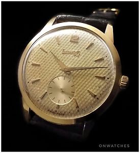 EBERHARD OVERSIZED INCREDIBLE 18K GOLD WRISTWATCH WITH A WONDERFUL TEXTURED DIAL