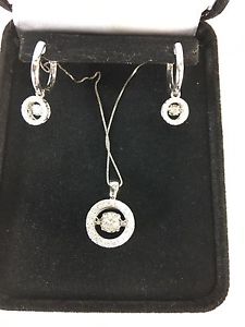 1/2 caret Diamond pendant and ear rings