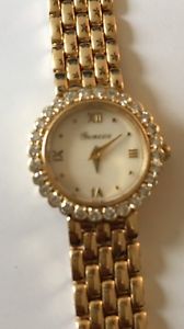 14 Kt Gold Geneve Watch With Diamonds Bezel And Pearl Face