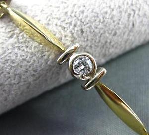 ESTATE 1.04CT DIAMOND 14KT WHITE & YELLOW GOLD TENSION SETTING BRACELET #1441