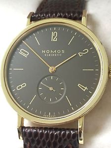 NOMOS GLASHÜTTE TANGENTE MOCCA HANDAUFZUG 18k GOLD GLASBODEN 36MM BOX & PAPIERE