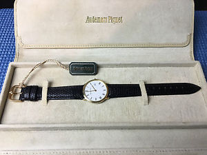 Audemars Piguet Swiss Quartz 18K solid gold watch 32mm w/orig box and tag