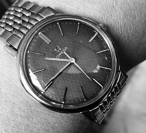VERY RARE OMEGA, MOVEMENT MANUAL 601, 34MM. WATCH END BRACELET OMEGA.