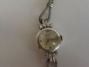 Vintage Ladies Movado White 14K Gold Diamonds Watch