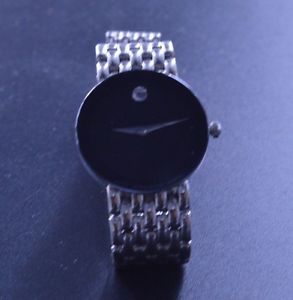 w359     18K  SOLID WHITE  GOLD  LADYS  MOVADO  WRISTWATCH