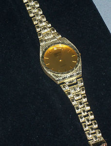10kt Solid Gold Mens Geneve Diamond nugget style watch.