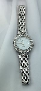 Lady's 14k white gold, MOP, 38 diamond Belair Swiss Quartz watch, sapp. crystal