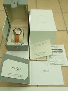 'LALIQUE MASCOT' watch and a gold bracelet with another boxed with papers & docs