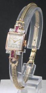 WONDERFUL GRUEN ROSE AND YELLOW GOLD LADIES WATCH WITH DIAMONDS RUBIES C1950