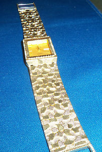 14kt gold Geneve men's diamond nugget day date watch. 57 grams.