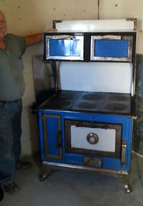 american beauty model 1892 cookstove ( blue with white enamel warming oven )