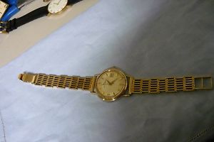 Vintage Quartz Lucien Piccard solid 14K yellow Gold watch and band for men