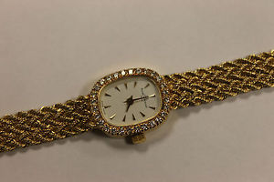 Women's Baume and Mercier 18k Gold and Diamond Watch