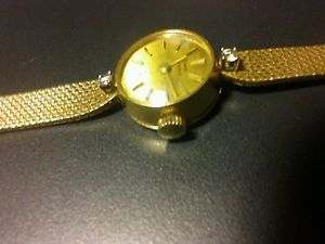 VINTAGE LADIES GIRARD-PERREGAUX 18K GOLD/DIAMOND WATCH.