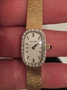 VINTAGE Ladies 14k Yellow Gold Oval  Movado Watch w/ Diamonds mfg. 1970s