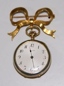 RE487 POCKET WATCH BROOCH VULCAIN. 18K GOLD, ENAMEL AND DIAMOND. WORKS. EARLY 20