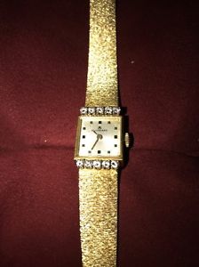 Vintage Bucherer diamond watch 18K yellow gold ladies .