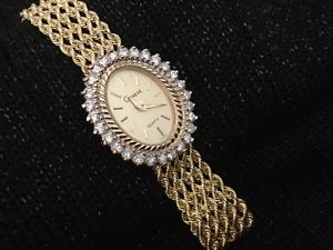 After 1st bid..no reserve.Swiss Geneve 1ctwDiamond / 14k solid yellow gold watch