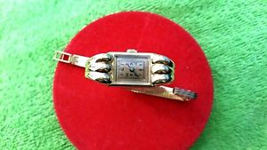 TRES BELLE MONTRE EN OR FEMME VINTAGE  25.77G 18 CRTS