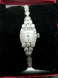 14k white gold Andre cheval ladies diamond watch. 1 carat tdw beautiful. Clean