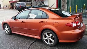 Mazda 6, 2005, Burnt Copper (like Orange), 4 cyl, 4 dr, 202,000 miles. fair cond