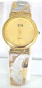 14k men's gold watch (band only 14k solid).  Don carlos quartz watch movement.