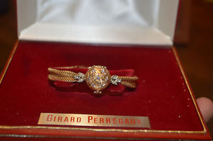 VINTAGE LADIES GIRARD-PERREGAUX 14K GOLD/DIAMOND WATCH.