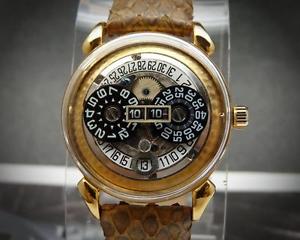 Handcrafted Jumping Hour gold plated men's watch automatic mechanical movement