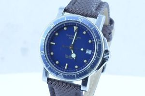 GIRARD-PERREGAUX MONTRE AUTOMATIQUE POUR HOMMES AIGLE DES MERS RÉF. 7100 ACIER/