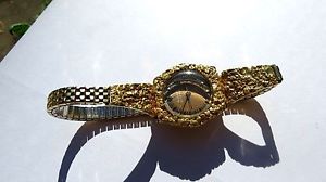 Alaska Womens 22-24k Solid gold nuggets & 10k Bulova Accutron watch. Running!!