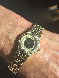 18k DIAMOND AND SOLID 18K YG CONCORD SARATOGA DESPOSE DATE WATCH - LADIE'S