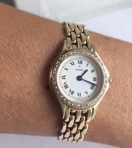 Genuine MOVADO Ladies watch in 14k solid yellow gold with brilliant diamonds