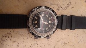 A very very rare vintage Sandoz compressor divers GMT manual movement watch