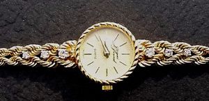 Jacques Piccard 14 carat gold watch and diamond band