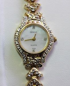 GENEVE 14K GOLD and DIAMOND BEZEL ALL AROUND WOMEN WATCH (*SC)
