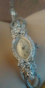 14kw/g Ladies Diamond  wrist watch Bulova Swiss made