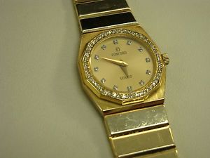14k yellow gold ladies diamond concord watch diamond dial diamond bazel