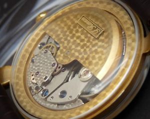 Handcrafted Jumping Hour gold plated men's watch automatic mechanical movement