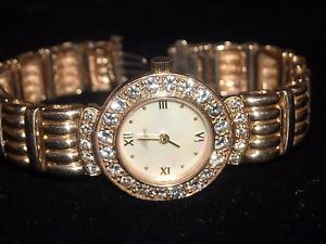 300 14k Y G diamond quarts watch mother of pearl face 28 dwt 1.5 TCW E VS1 6.25"