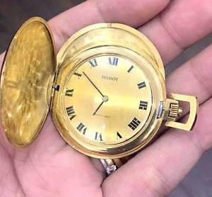 Tissots and Fils18k solid gold pocket watch 49 gram , 42mm diameter