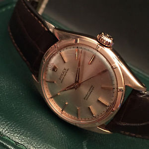 ROLEX Oyster Perpetual 750 Rose Gold Ref. 6085 with original crown.
